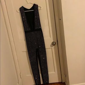 Black and silver romper/never worn before